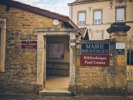 July 19, 2017. Village Ameugny France burgundy region in summer. Old stone facade of the apartment buildings. Architecture of old france.のeditorial素材