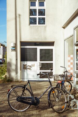 October 21, 2018. City Krefeld Germany. Urban one bike parked without anyone on a sunny day in the fall on a European street.のeditorial素材