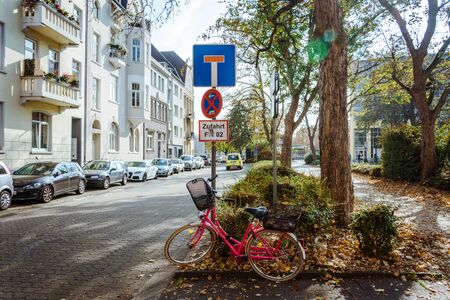 October 21, 2018. City Krefeld Germany. Urban one bike parked without anyone on a sunny day in the fall on a European street.のeditorial素材