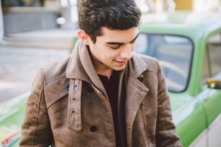 Portrait of a model young handsome sexy male brunette guy with dark skin Turkish Middle Eastern...