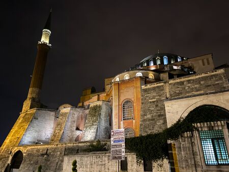 Ayasofya Museum, Hagia Sophia in Sultan Ahmet park in Istanbul, Turkey October 25, 2019 in a beautiful summer night scene and street lights. Ayasofya, outside at night with minaret.のeditorial素材