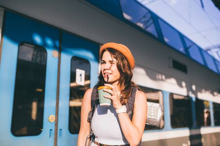 Tourism and travel in the summer. Vacations for the student. Work and travel. Caucasian young woman...