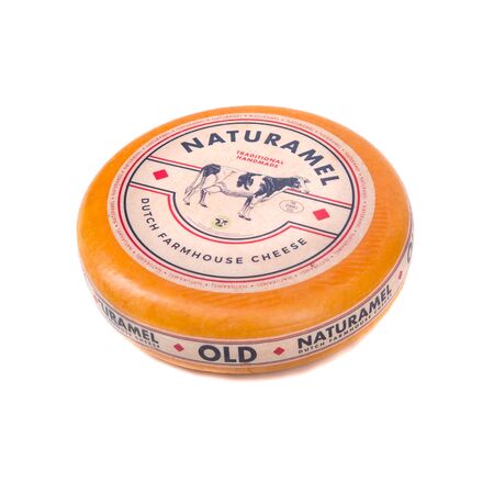 Cheese wheel isolated on white background. head cheese editorial isolate. round Italian cheese slabs in close-up. Ukraine, Kiev, December 6, 2019.のeditorial素材