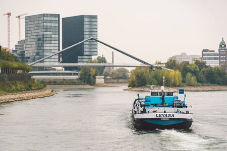 27 October 2018 Germany, Dusseldorf. North Rhine. Cargo ship, barge goes along the North Rhine...