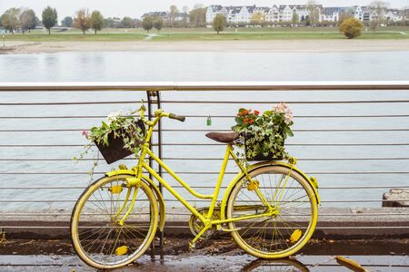 Bicycle Parked On City Street. A city bike in Dusseldorf. Urban bike parked without anyone on European street. Bicycle ecological mode of transport in Europe. Dusseldorf, Germany October 25, 2018.の写真素材