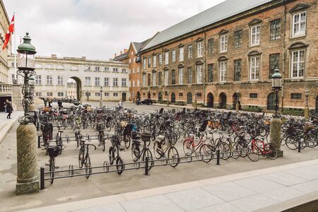 Copenhagen, Denmark. February 20, 2019. lots of Bicycles on bicycle parking in front of Danish...