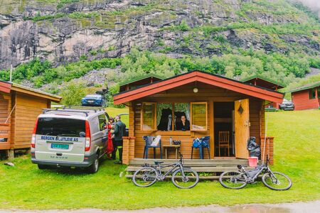 Traditional red camping houses in Lunde Camping, Norway July 21, 2019. Classical Norwegian Camping site with traditional wooden red cottages, Northern Norway. Camping cabins.のeditorial素材