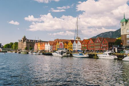 Bergen, Norway. View of historical buildings in Bryggen. Hanseatic wharf in Bergen, Norway July 28, 2019. UNESCO. Famous Bryggen street with wooden colored houses in Bergen Akerbrygge distric.のeditorial素材