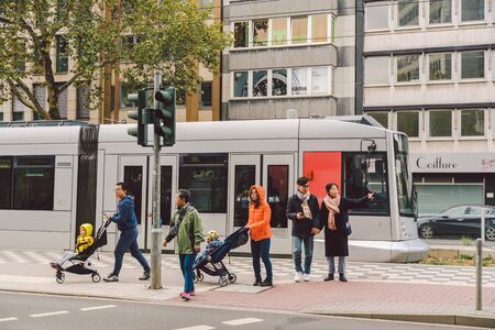 high-speed tram on the city street. Modern Tram In Dusseldorf, Germany October 27, 2018. The...
