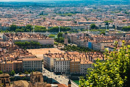 Lyon panorama elevated view on sunny day. Aerial panoramic view of Lyon with the skyline. Bellecour Square And Place Poncet, Lyon, France.の写真素材
