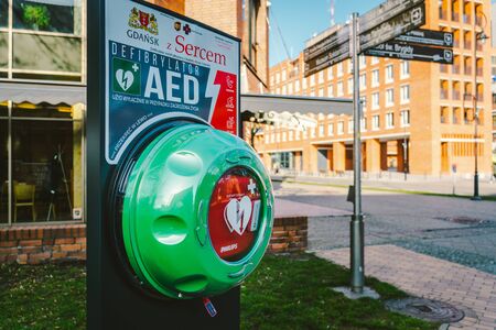 Automated External Defibrillator AED Philips on the street in the city of Gdansk, Poland on February 8, 2020. AED CPR Rescue Kits box. Medical equipment to save life in case. Street defibrillator.のeditorial素材