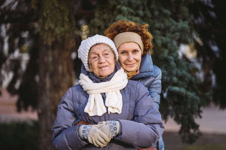 Couple of Caucasian mature woman and senior female are happy to spend time on Christmas and New Year...