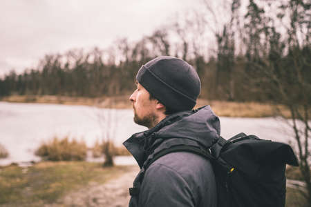 Concept of loneliness in life. Person was isolated from others connect with nature. Thinking about life. Stressful depressed emotional person with anxiety disorder mental health illness feeling bad.の写真素材