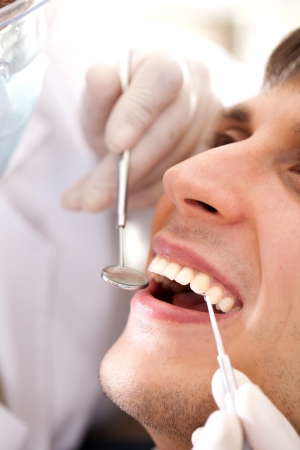A man visiting the dentistの写真素材