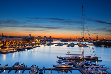 Panoramic View Of The Beautiful Blue And Orange Sky Of Helsinki Harbor With Boats And Yachts At A Summer Night. Capital Of Finland Europe's Travel Sightseeingの写真素材