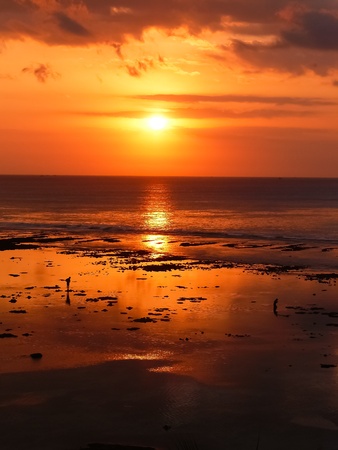 A sweet sunset at Bingin beach in Baliの写真素材