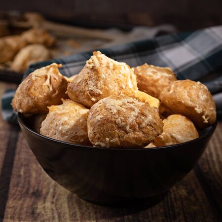 French pastry called gougere presented into a black bowl