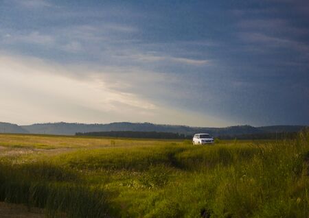 car on the background of the morning skyの写真素材
