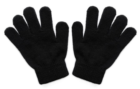 Warm black woollen gloves isolated on white background.の写真素材