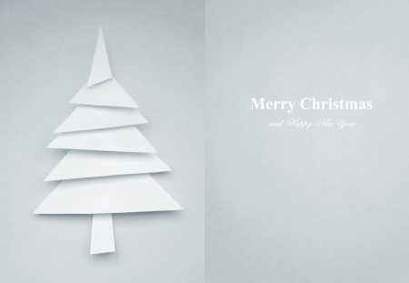 Greeting Card of christmas tree made of paper for your designの写真素材