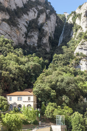 BARCELONA, SPAIN - JULY 10, 2015: Lower and upper funicular stations De La Santa Cova. Funicular allows climb the mountain of Montserrat.のeditorial素材
