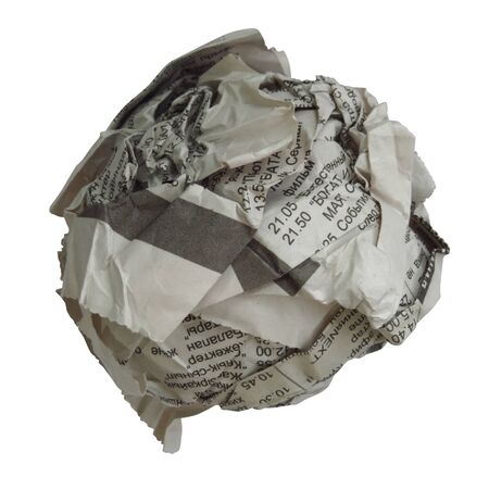 Crumpled newspaper isolated on white. Photo with clipping path.の写真素材