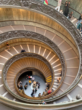 Rome, Italy - March 31, 2023: Bramante Staircase in Vatican city. People go on a unique picturesque spiral staircase in the building of the Vatican Museums.のeditorial素材