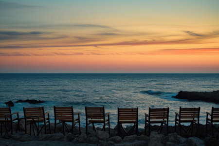 Chairs strategically placed along the coast, inviting conversations with the seaの素材