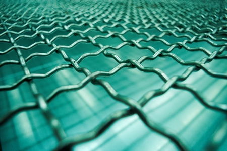Stainless steel mesh background, square wireframe stainless material.の写真素材
