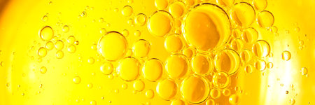 Cooking oil, cooking background, yellow oil drops and water kitchen.の写真素材