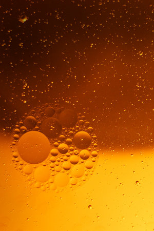 Yellow bubbles background, cooking oil emulsion, frying.の写真素材