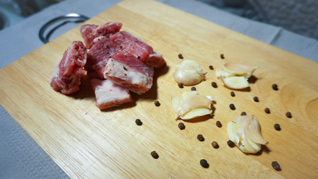 Sliced pork ribs with black pepper and garlicの写真素材