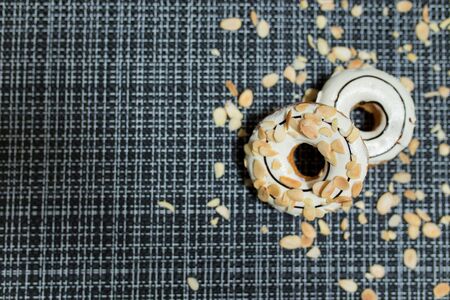Two White chocolate Almond Donutの写真素材