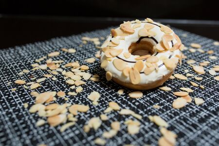 White chocolate Donut with Almond sliced