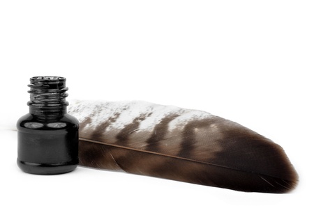 Feathers and ink bottle の写真素材