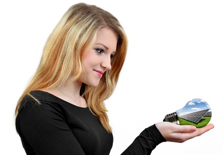 girl holding in hands bulbの写真素材