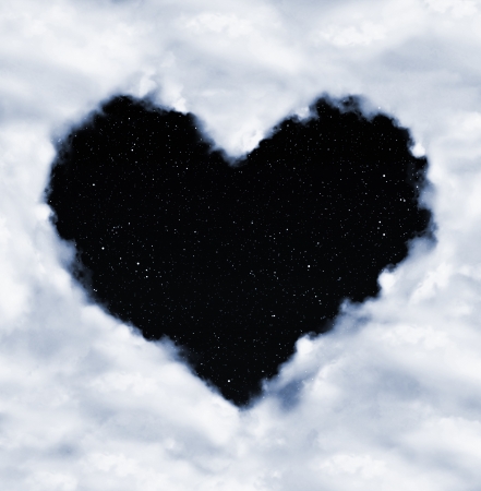 heart from clouds on night sky の写真素材