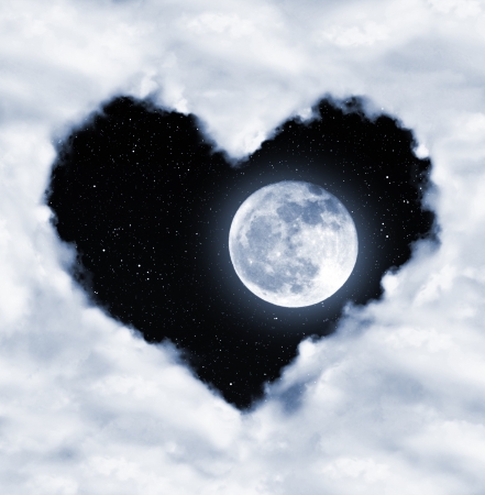 heart from clouds on night sky の写真素材