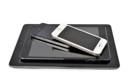 Plzen,Czech Republic - October 11, 2014 : iPad air ,iPad mini ,iPhone 4S and iPhone 5S Smart Phone...