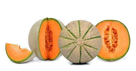 orange cantaloupe melons isolated on white backgroundの写真素材