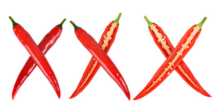 xxx made from red hot chilli peppers isolated on whiteの写真素材