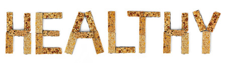 The word Healthy from muesli bars isolated on white backgroundの写真素材
