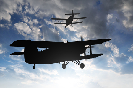engine airplane flying at sunsetの写真素材