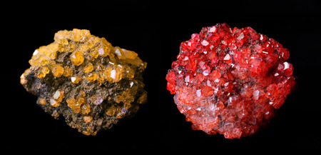 Yellow and red mineral crystals Mimetite isolated on black background.の写真素材