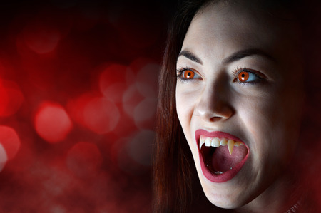 Halloween angry vampire woman. Horror theme.