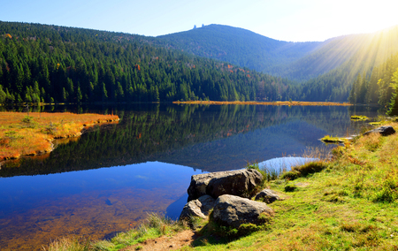 Moraine lake Kleiner Arbersee with mount Grosser Arber in National park Bavarian forest. Autumn landscape in Germany.の写真素材