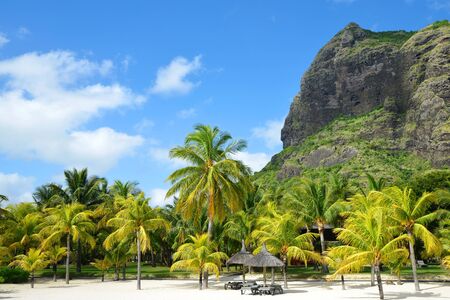 Beautiful sandy beach with Le Morne Brabant on the south of Mauritius island. Tropical landscape.の写真素材