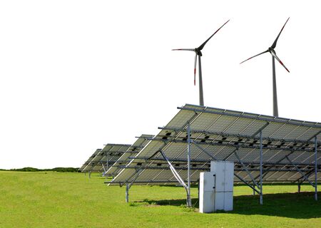 Solar energy panels with wind turbines on meadow background.Sustainable resources concept.の写真素材