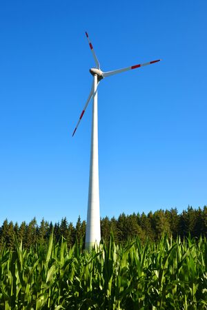 Wind turbine in summer landscape.Concept of clean energy.の写真素材