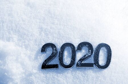 Number 2020 on snow. New Year concept.の写真素材